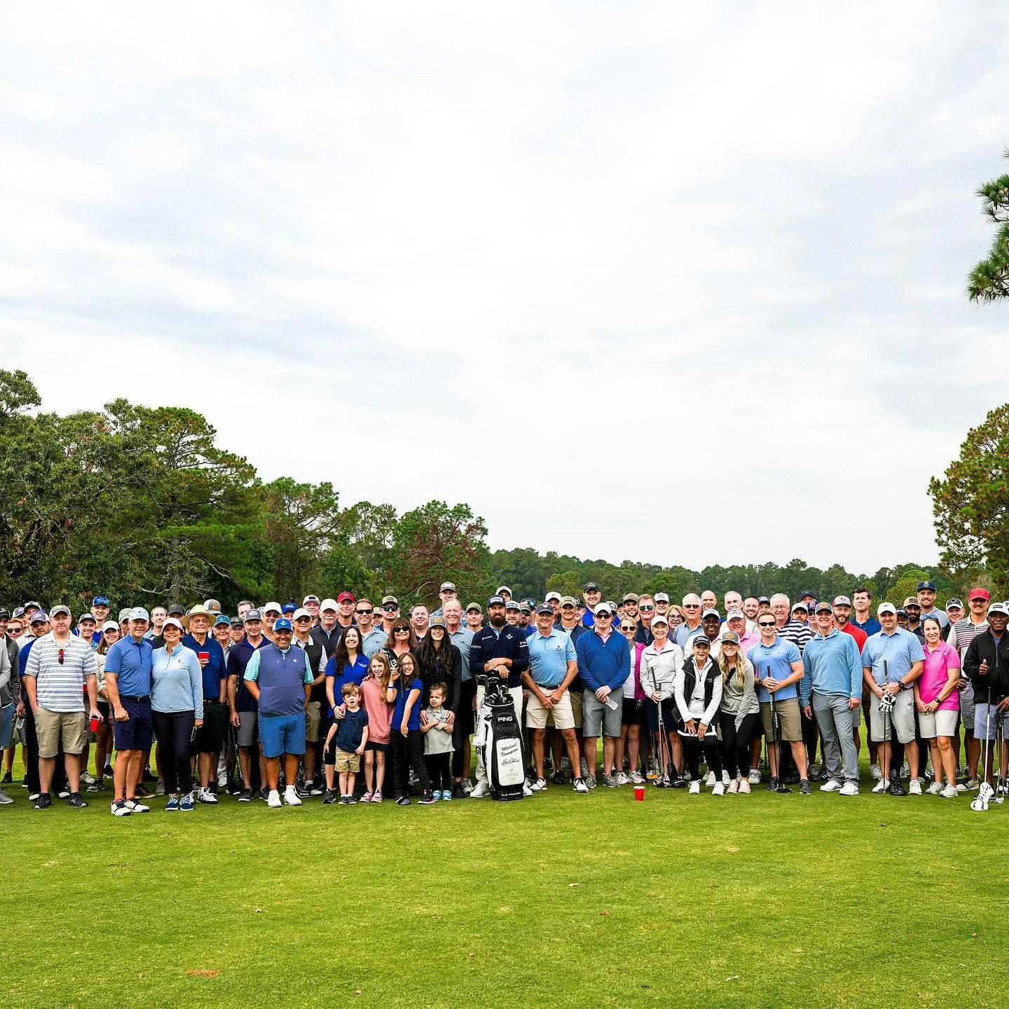 The full field of golfers and supporters with PGA Tour pro Michael Thompson at the GGMF tournament